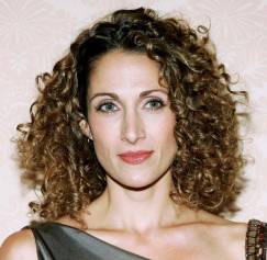 Course, thick curls cut in the traditional accordion style.